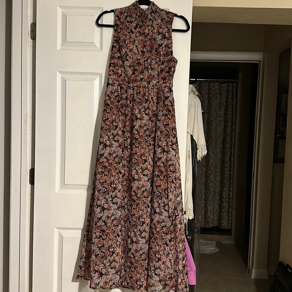 BCBGeneration maxi dress with cutout back detail. Lined through knees. NWT!